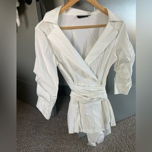 Small white new blouse, great fabric